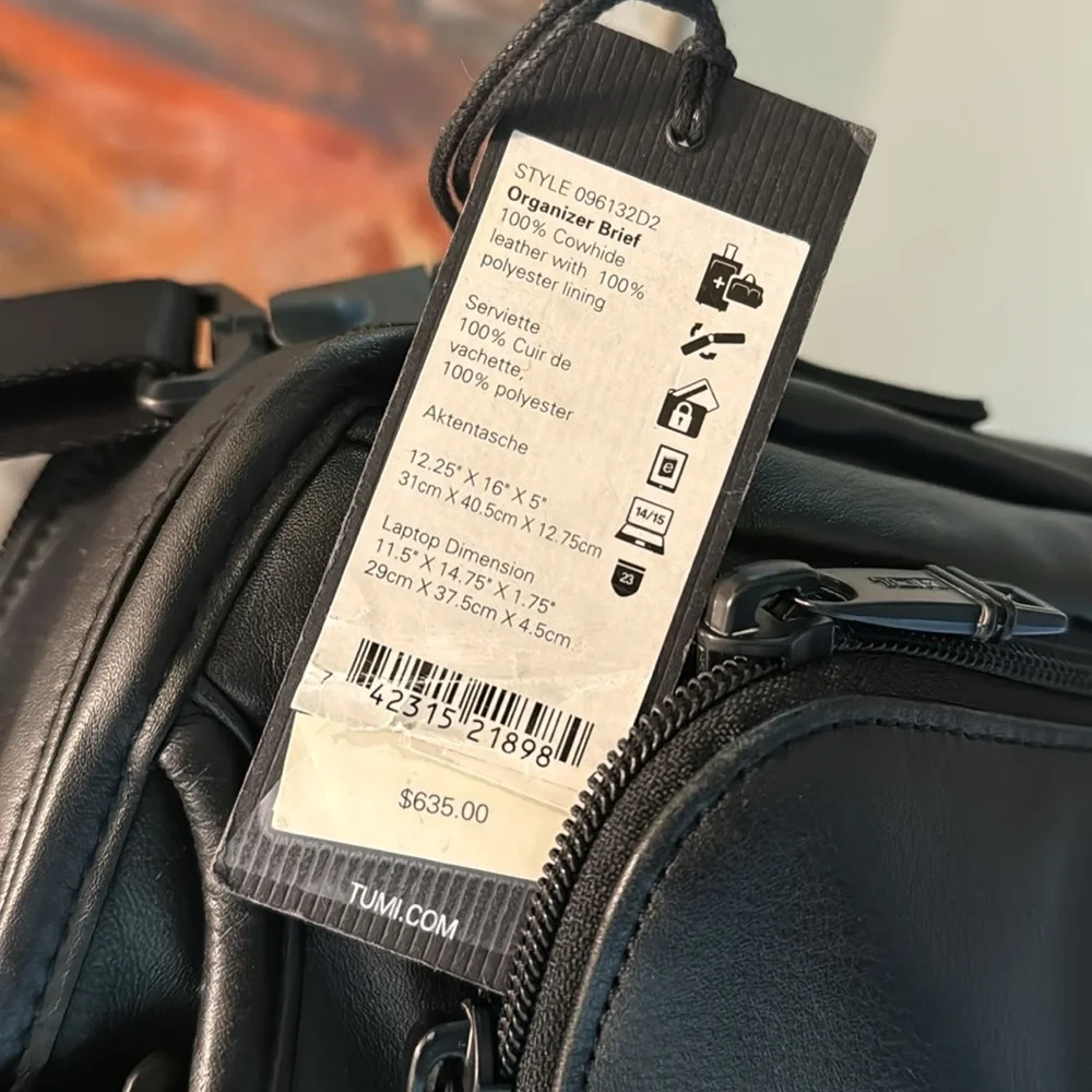 TUMi black leather computer briefcase carry-on VGC long strap multiple pockets